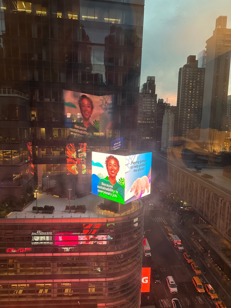 view from the window the Westin hotel in Times Square.  Sunset, large screens with advertising on a cityscape.